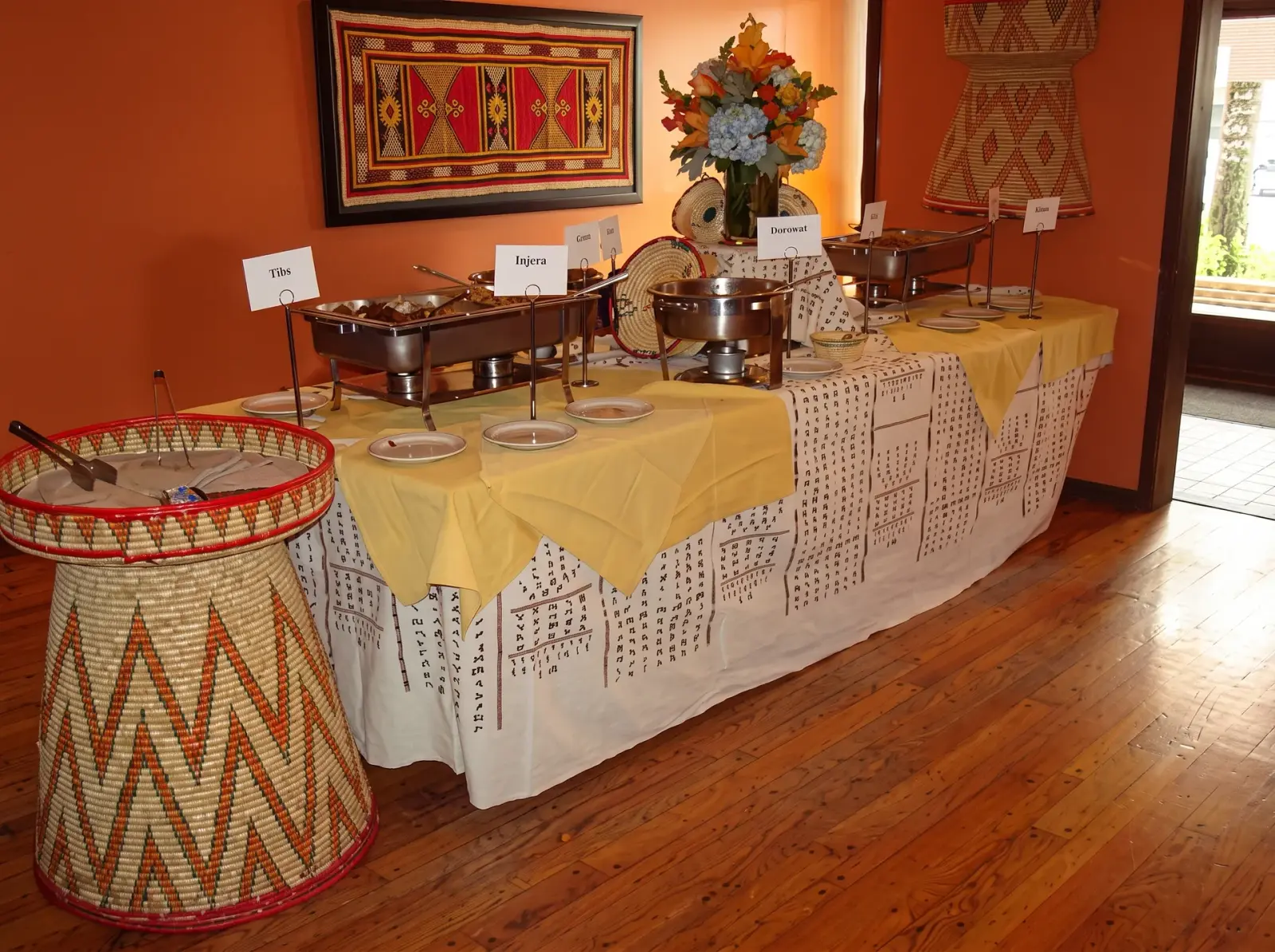 Ethiopian catering platter with injera and colorful dishes