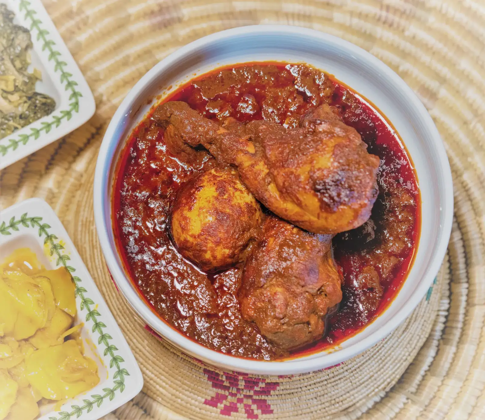 Doro kay wet served over injera at Mesob